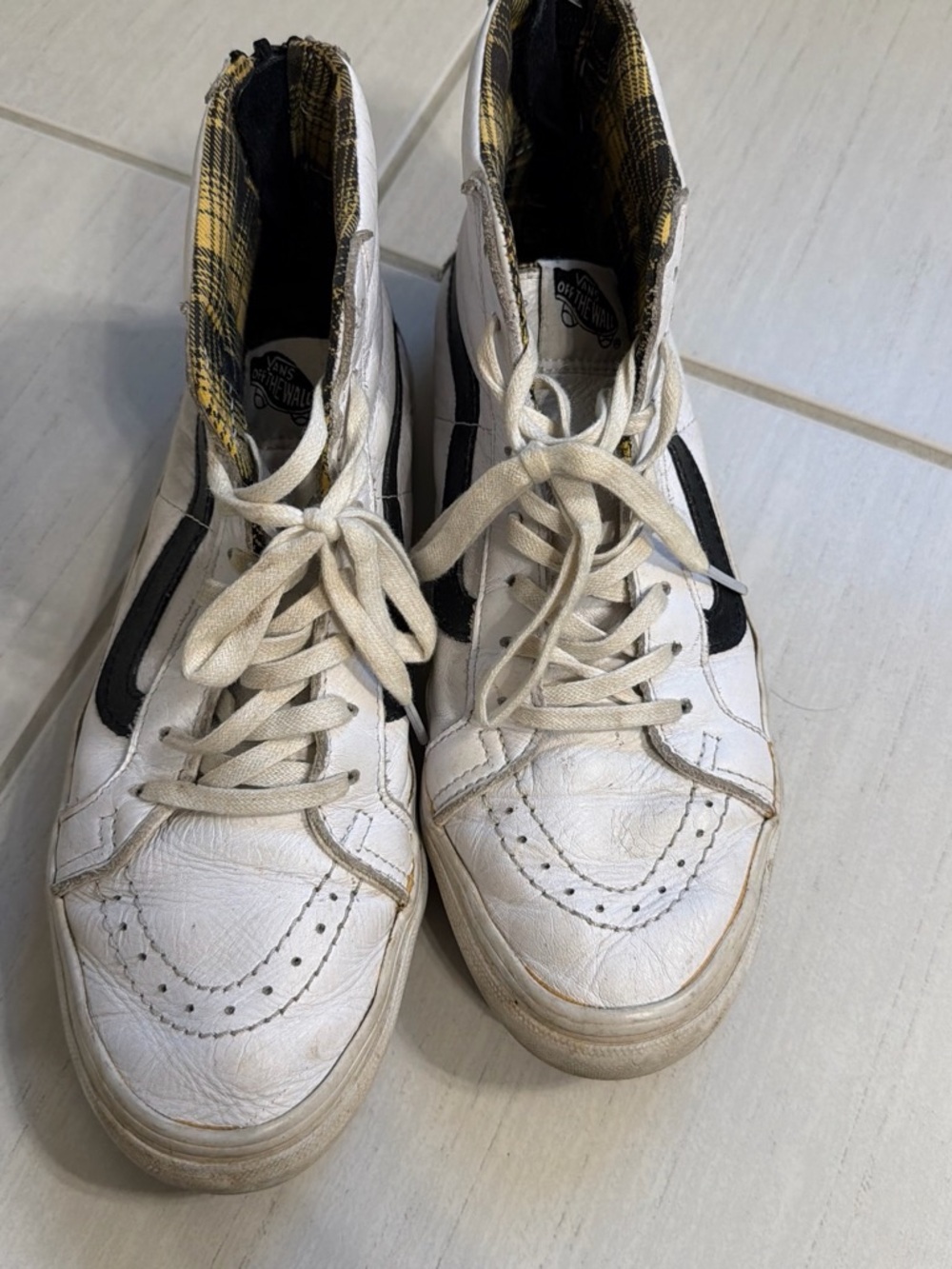 Vans White High-Top Sneakers with Black Side Stripe